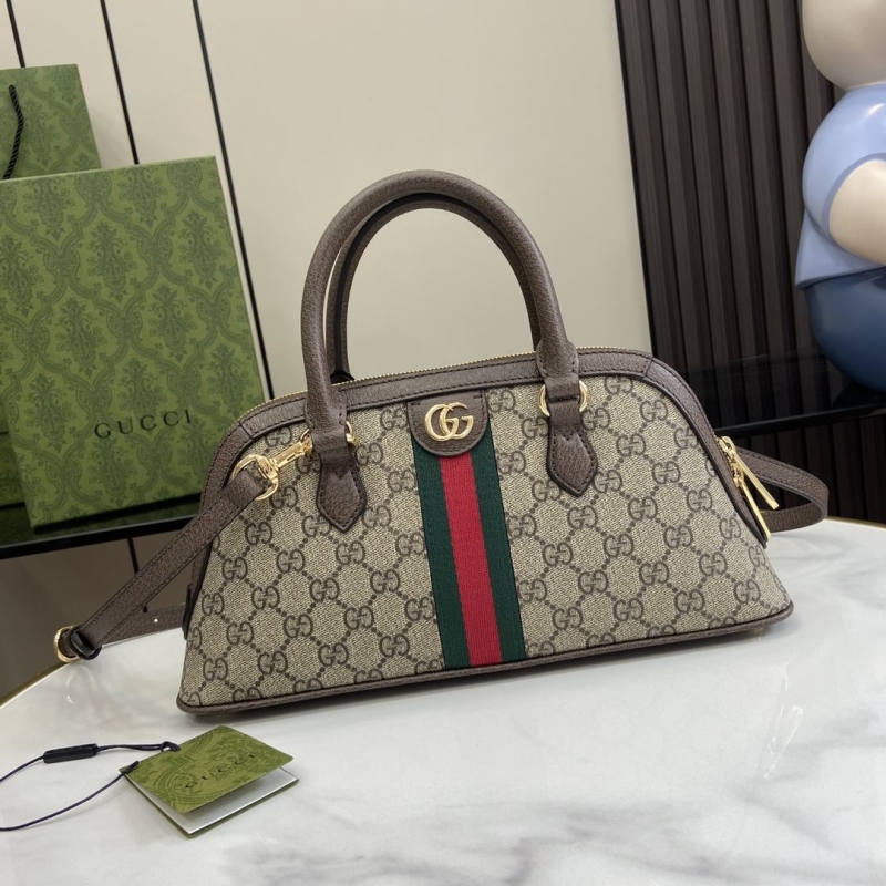 G*u*i top handle bags